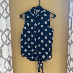 Tie slightly cropped black and white polkadot sheer top